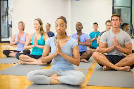 Reviewing Yoga’s Role in Relation to Contemporary Collective Concerns